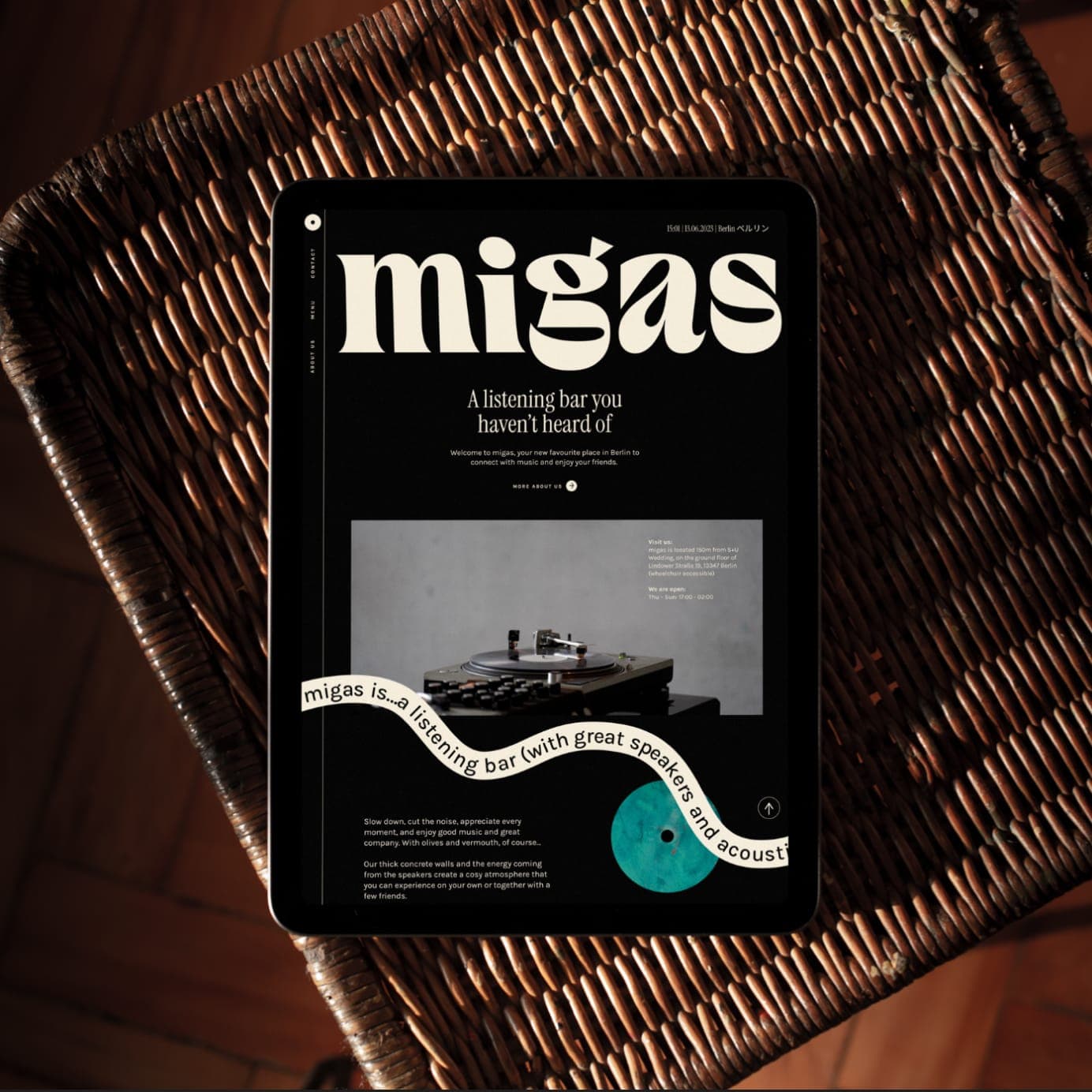 An iPad displaying the Migas website